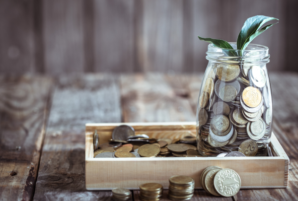 bank-with-coins-green-sprout.png